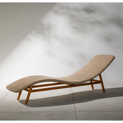 Portia Outdoor Chaise by Four Hands. Made from 100% polyethylene, solid teak, iron in a coastal style.