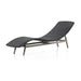 Portia Outdoor Chaise by Four Hands. Made from 100% polyethylene, solid teak, iron in a coastal style.