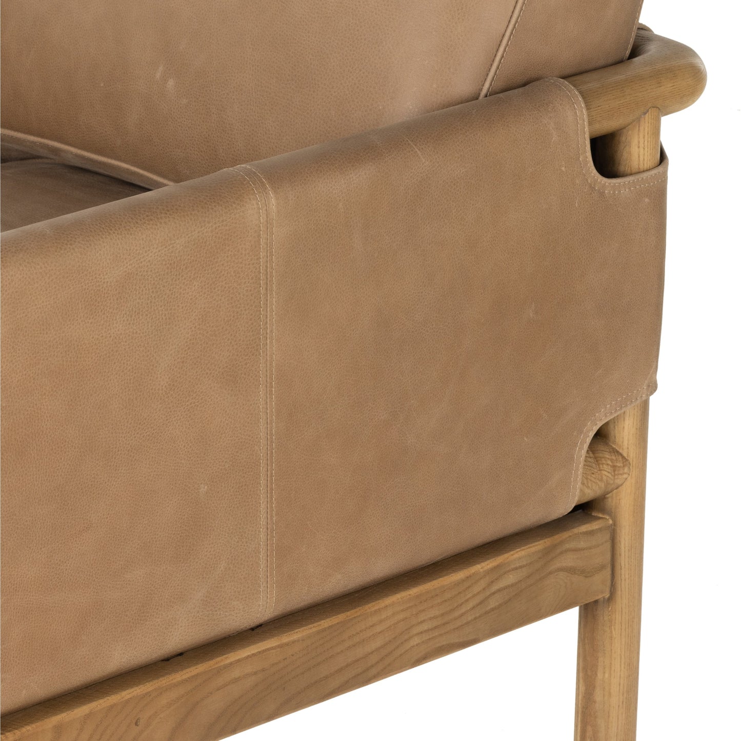 017 SI-1902841 | Closeup | Navarro Chair by Four Hands in palermo drift. Made from top grain leather, solid ash, 100% polyester in a modern style.