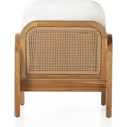 Merit Outdoor Chair by Four Hands in natural ivory and natural teak. Made from 100% olefin, solid fsc®-certified teak, 100% polyethylene in a coastal style.