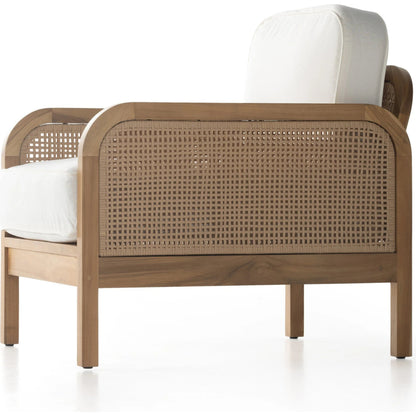 Merit Outdoor Chair by Four Hands in natural ivory and natural teak. Made from 100% olefin, solid fsc®-certified teak, 100% polyethylene in a coastal style.