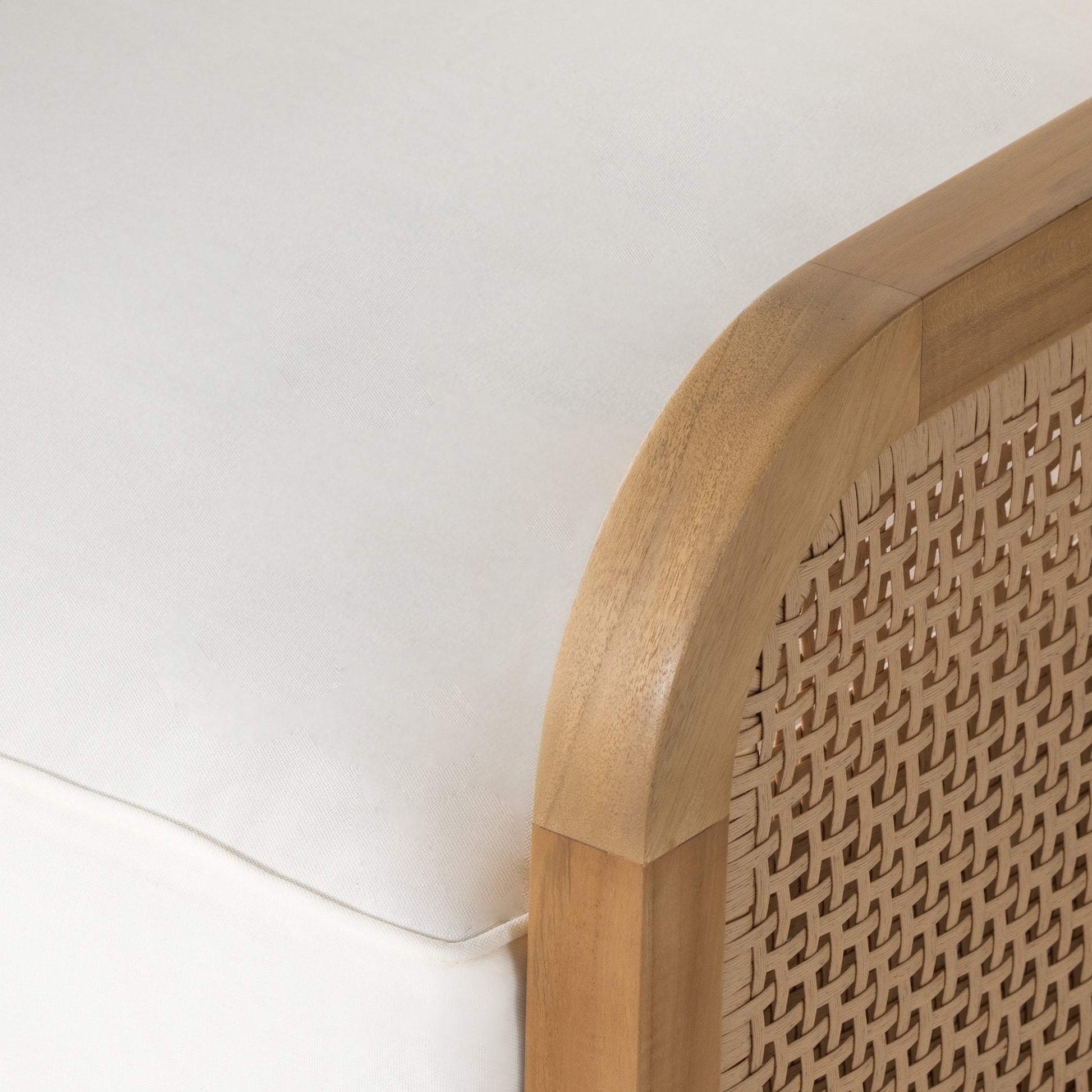 Merit Outdoor Chair by Four Hands in natural ivory and natural teak. Made from 100% olefin, solid fsc®-certified teak, 100% polyethylene in a coastal style.