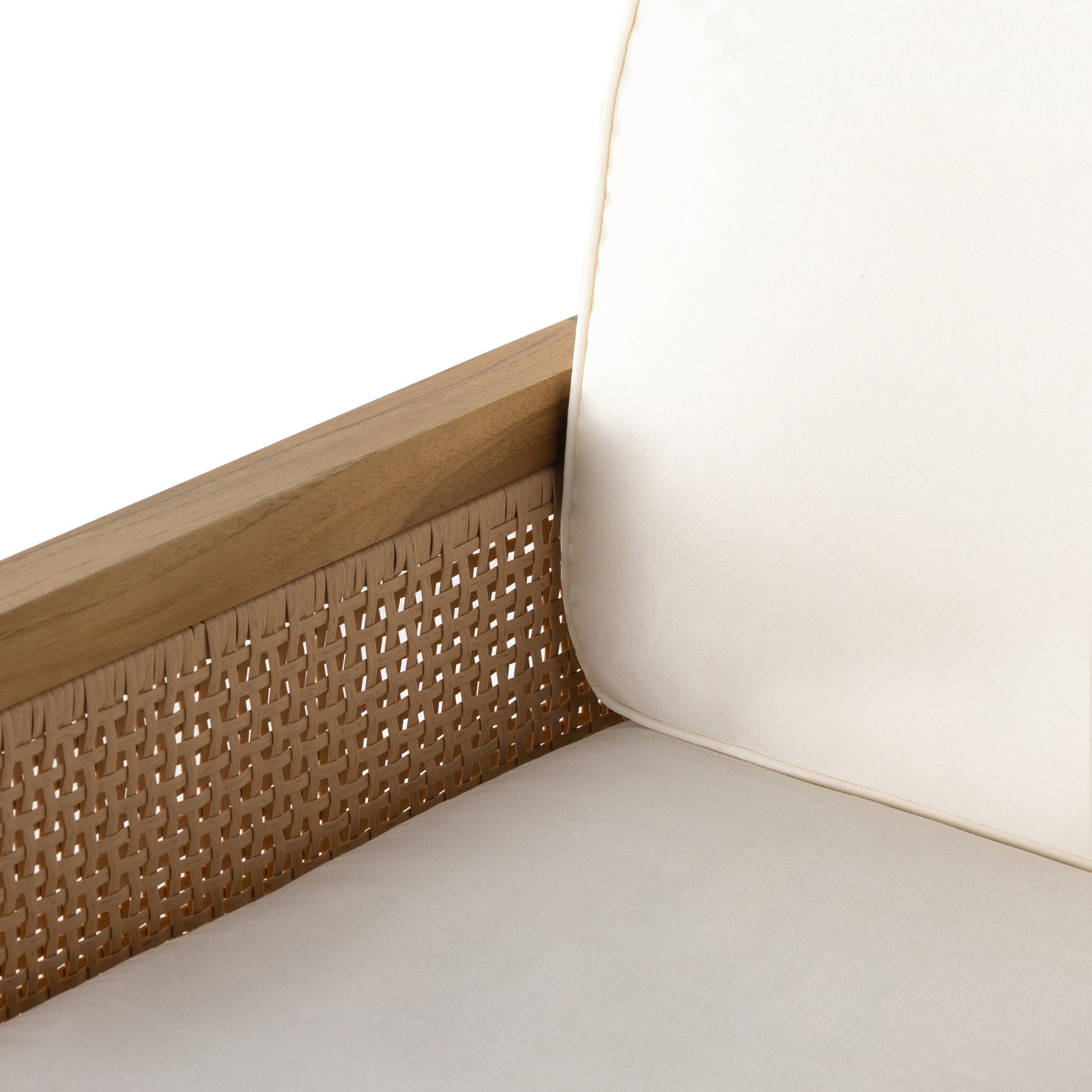 Merit Outdoor Chair by Four Hands in natural ivory and natural teak. Made from 100% olefin, solid fsc®-certified teak, 100% polyethylene in a coastal style.