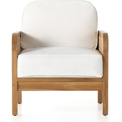 Merit Outdoor Chair by Four Hands in natural ivory and natural teak. Made from 100% olefin, solid fsc®-certified teak, 100% polyethylene in a coastal style.
