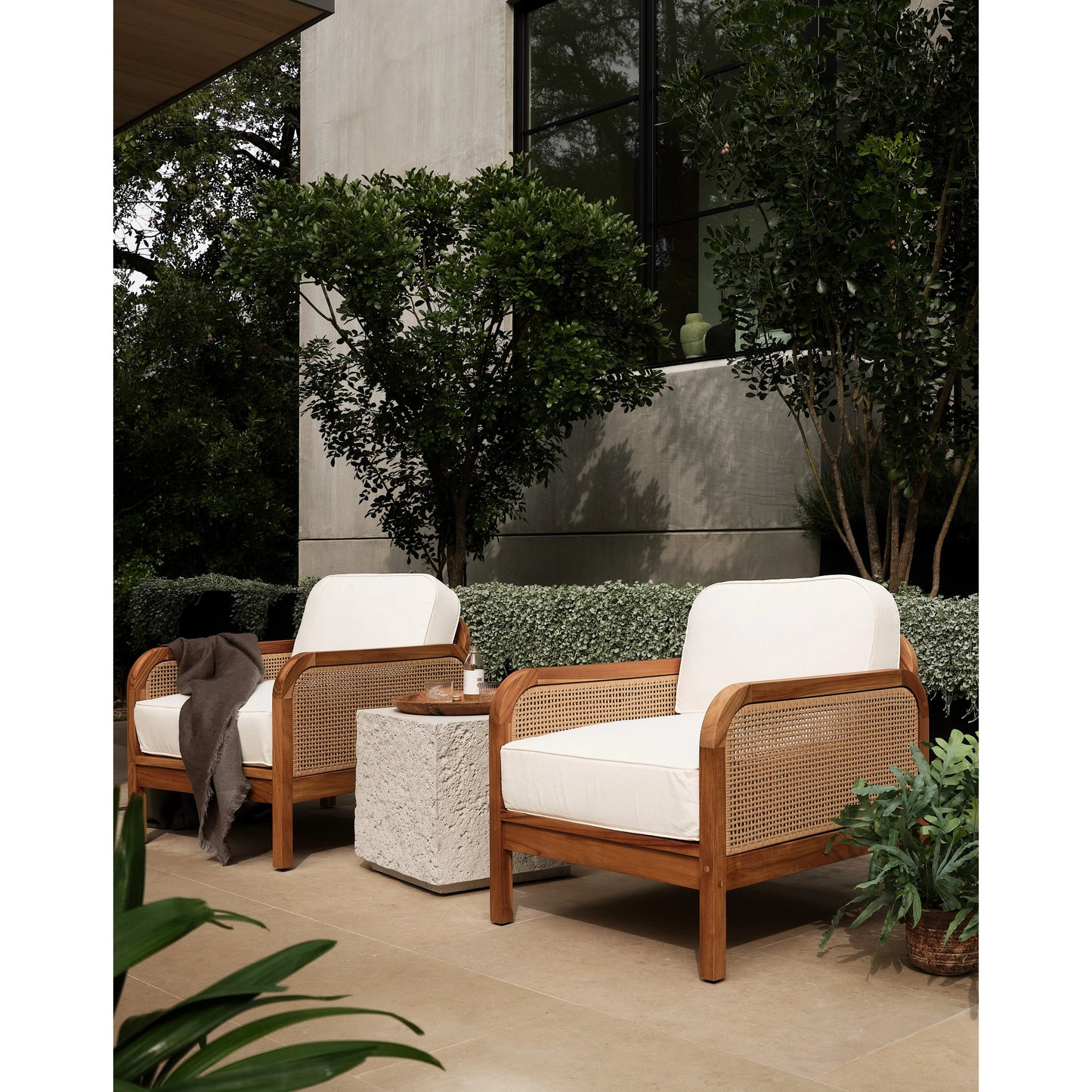 011 SI-1901258 | Lifestyle | Merit Outdoor Chair by Four Hands in natural ivory and natural teak. Made from 100% olefin, solid fsc®-certified teak, 100% polyethylene in a coastal style.