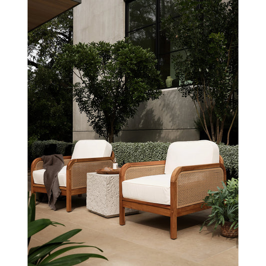 Merit Outdoor Chair by Four Hands in natural ivory and natural teak. Made from 100% olefin, solid fsc®-certified teak, 100% polyethylene in a coastal style.