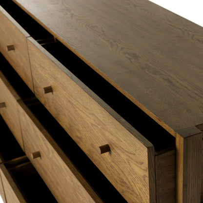 Meadow 6 Drawer Dresser by Four Hands in tawny oak. Made from solid oak, oak veneer in a modern style.