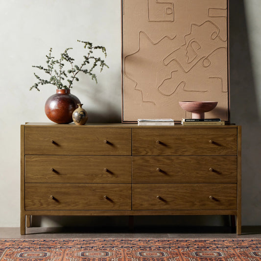 Meadow 6 Drawer Dresser by Four Hands in tawny oak. Made from solid oak, oak veneer in a modern style.