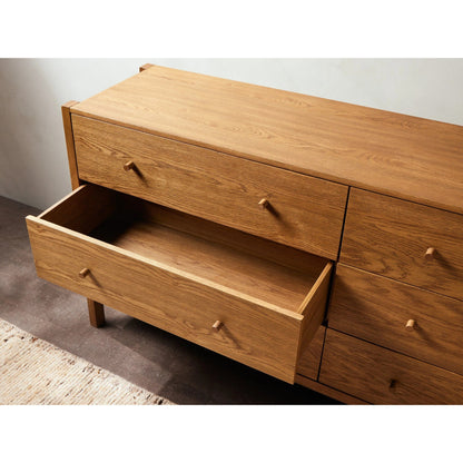 Meadow 6 Drawer Dresser by Four Hands in tawny oak. Made from solid oak, oak veneer in a modern style.