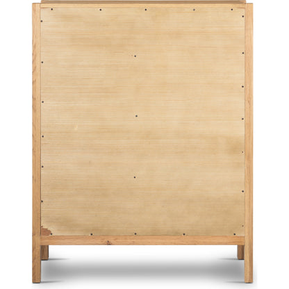 Meadow 5 Drawer Dresser by Four Hands in tawny oak. Made from solid oak, oak veneer in a modern style.