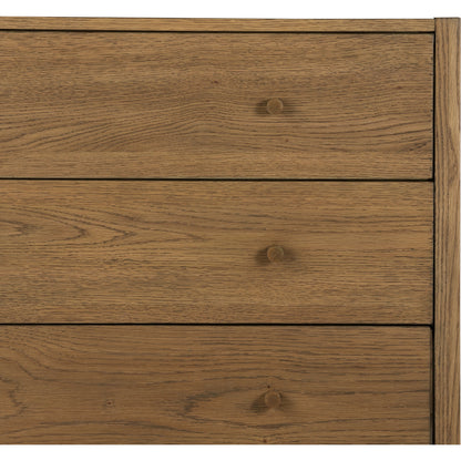 Meadow 5 Drawer Dresser by Four Hands in tawny oak. Made from solid oak, oak veneer in a modern style.