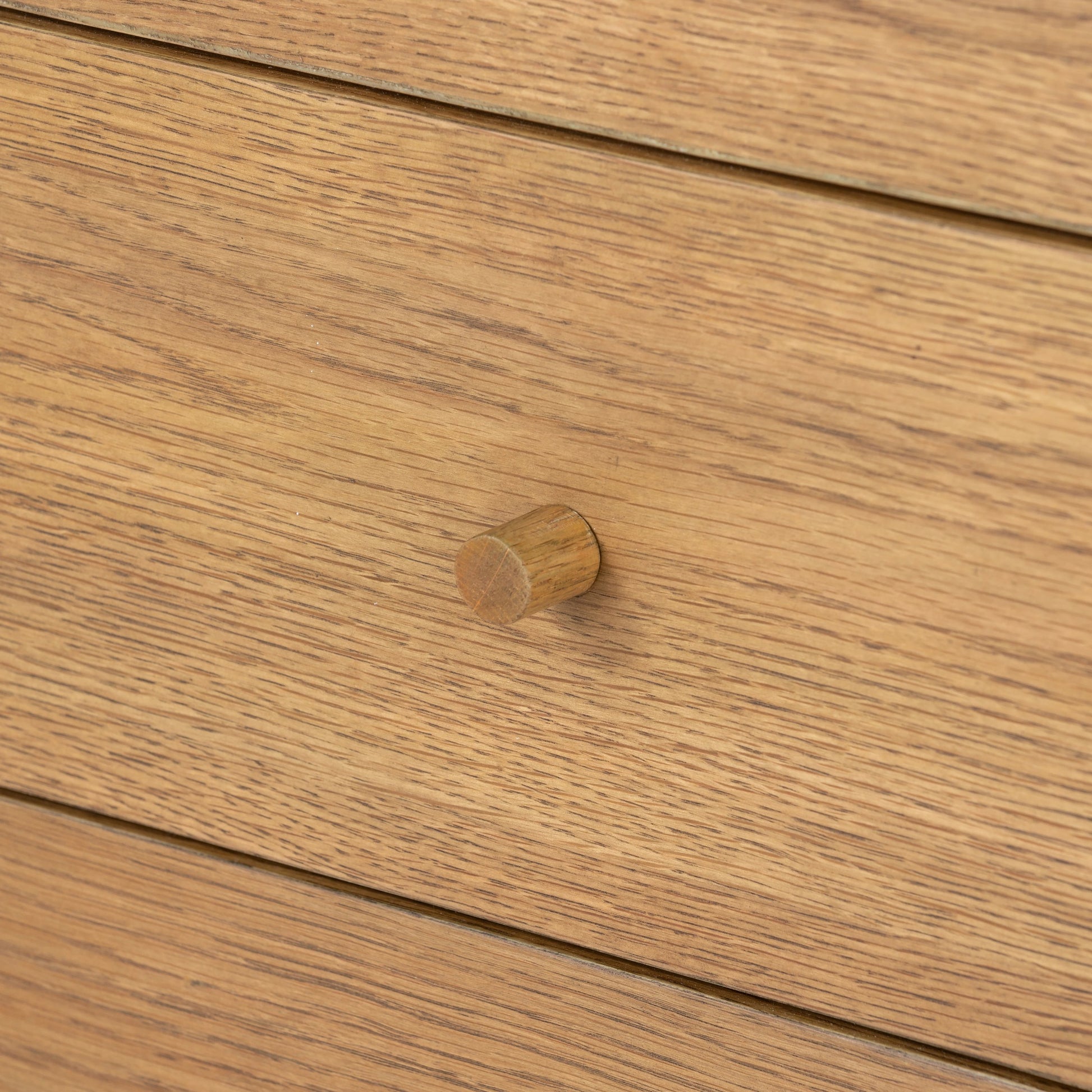 Meadow 5 Drawer Dresser by Four Hands in tawny oak. Made from solid oak, oak veneer in a modern style.