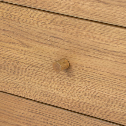 Meadow 5 Drawer Dresser by Four Hands in tawny oak. Made from solid oak, oak veneer in a modern style.