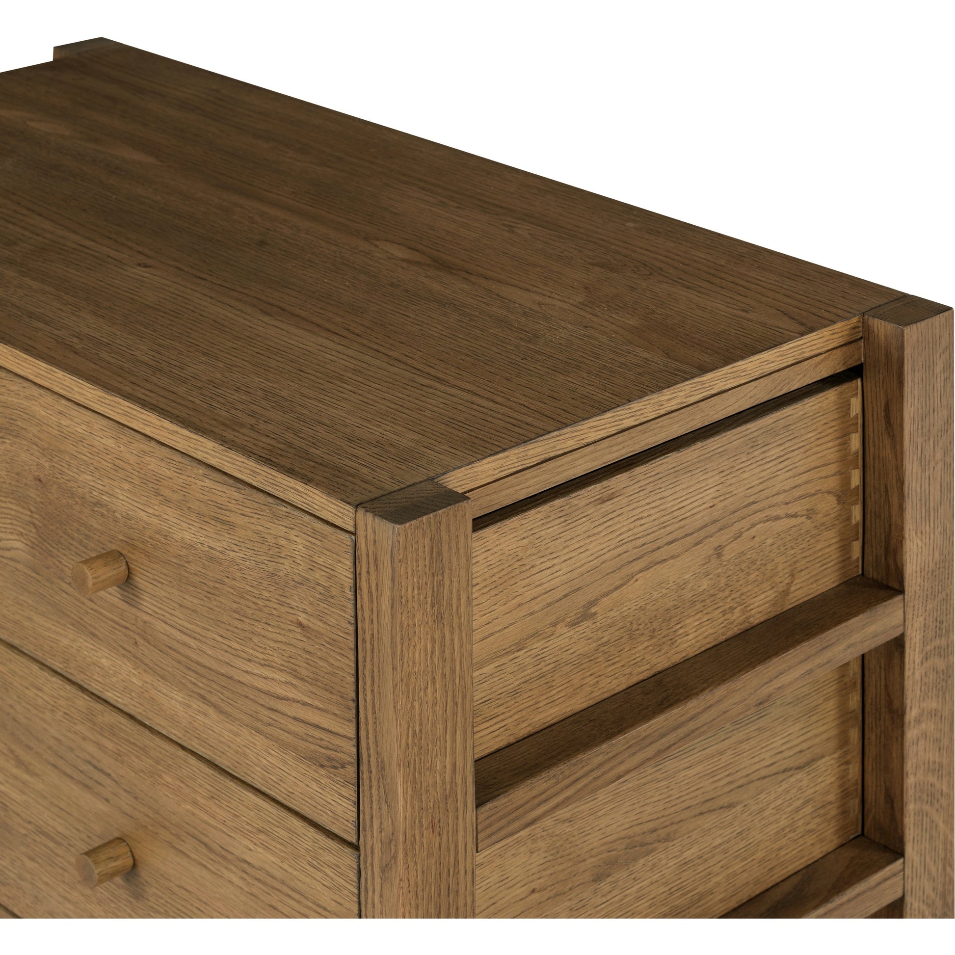 Meadow 5 Drawer Dresser by Four Hands in tawny oak. Made from solid oak, oak veneer in a modern style.