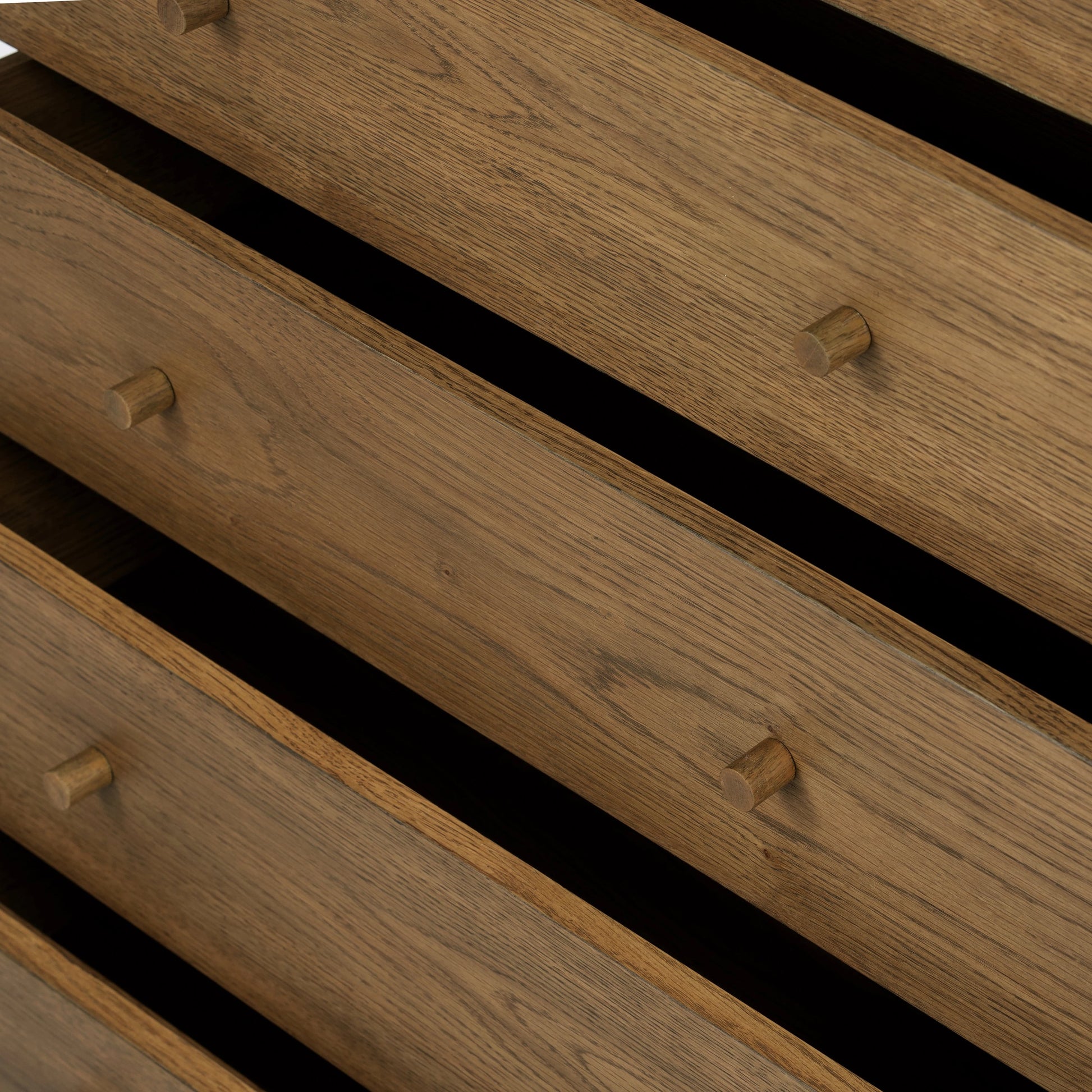 Meadow 5 Drawer Dresser by Four Hands in tawny oak. Made from solid oak, oak veneer in a modern style.