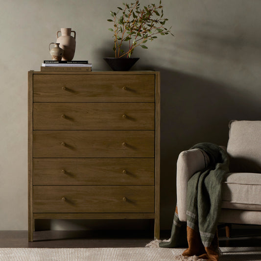 Meadow 5 Drawer Dresser by Four Hands in tawny oak. Made from solid oak, oak veneer in a modern style.