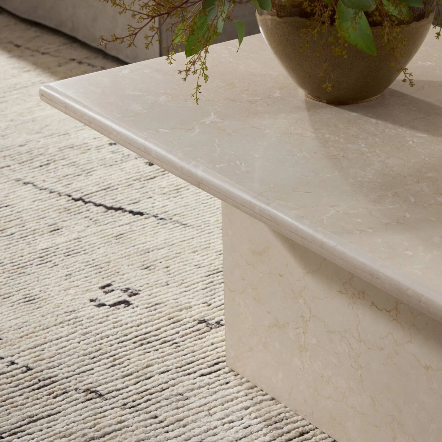 022 SI-1901544 | Closeup | Arum Coffee Table by Four Hands in cream marble. Made from solid marble in a coastal style.