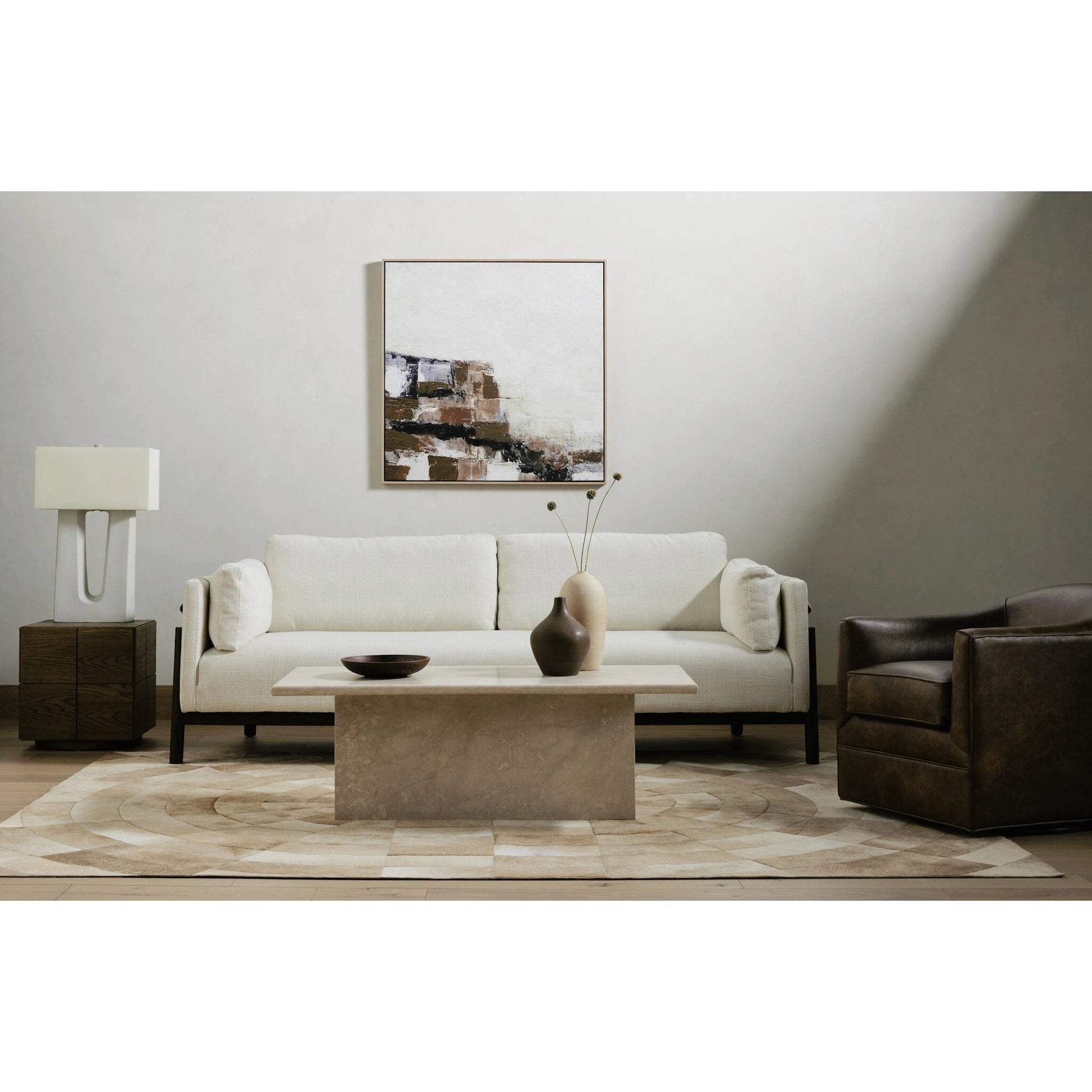 Arum Coffee Table by Four Hands in cream marble. Made from solid marble in a coastal style.