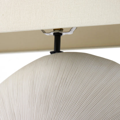 Busaba Table Lamp by Four Hands. Made from ceramic, 65% polyester, 35% flax, linen, thermoplastic in a modern style.