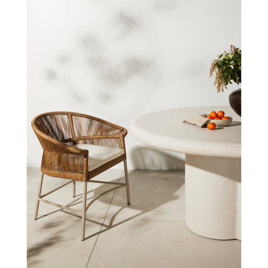 Irving Outdoor Dining Armchair by Four Hands in textured sand, dove taupe, natural ivory. Made from aluminum, 100% polyethylene, 100% olefin in a coastal style.