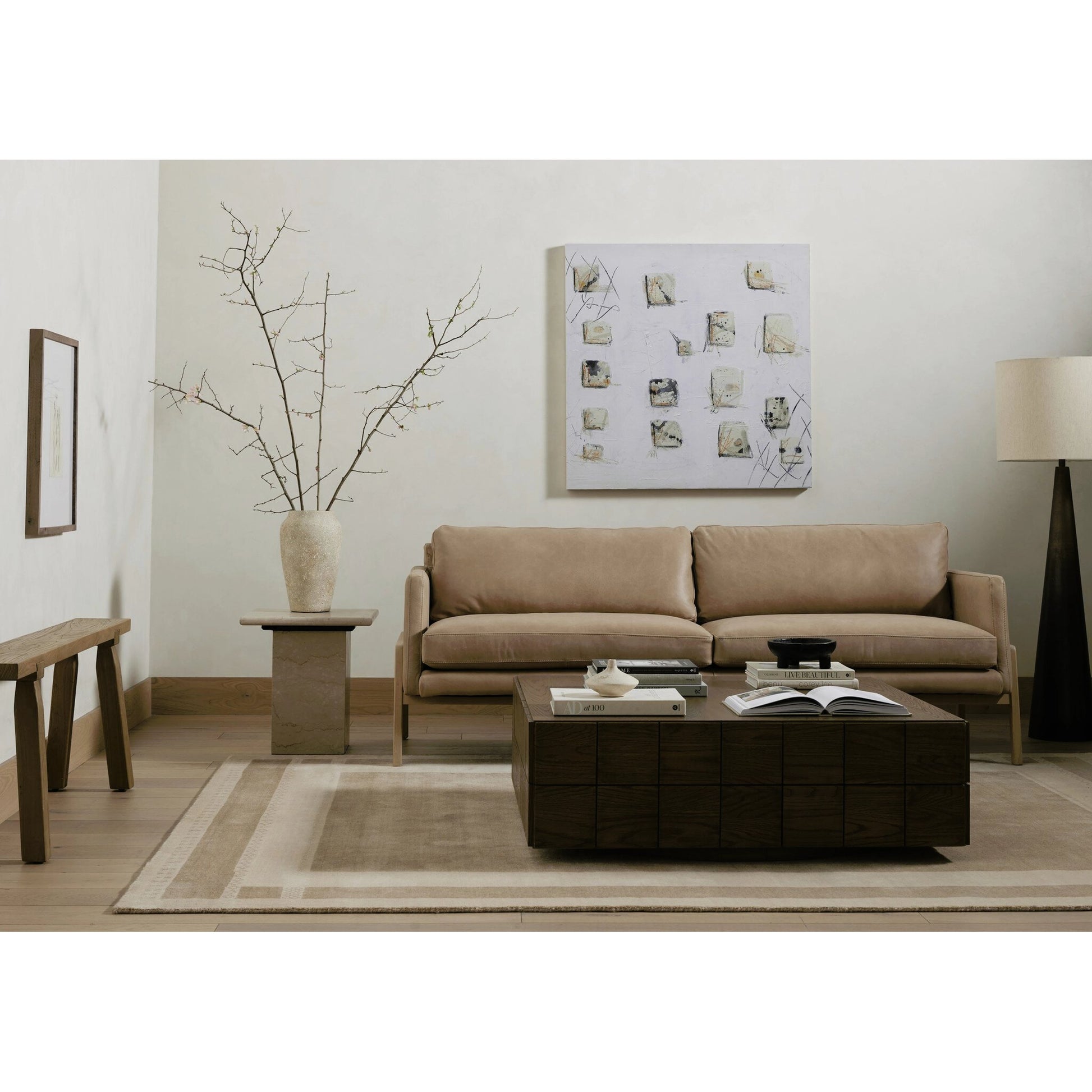 Arum End Table by Four Hands in cream marble. Made from solid marble in a transitional style.