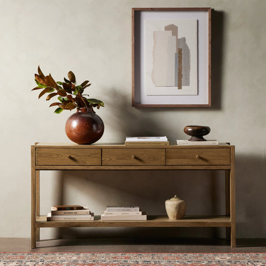 Meadow Console Table by Four Hands in tawny oak. Made from oak veneer, solid oak in a modern style.