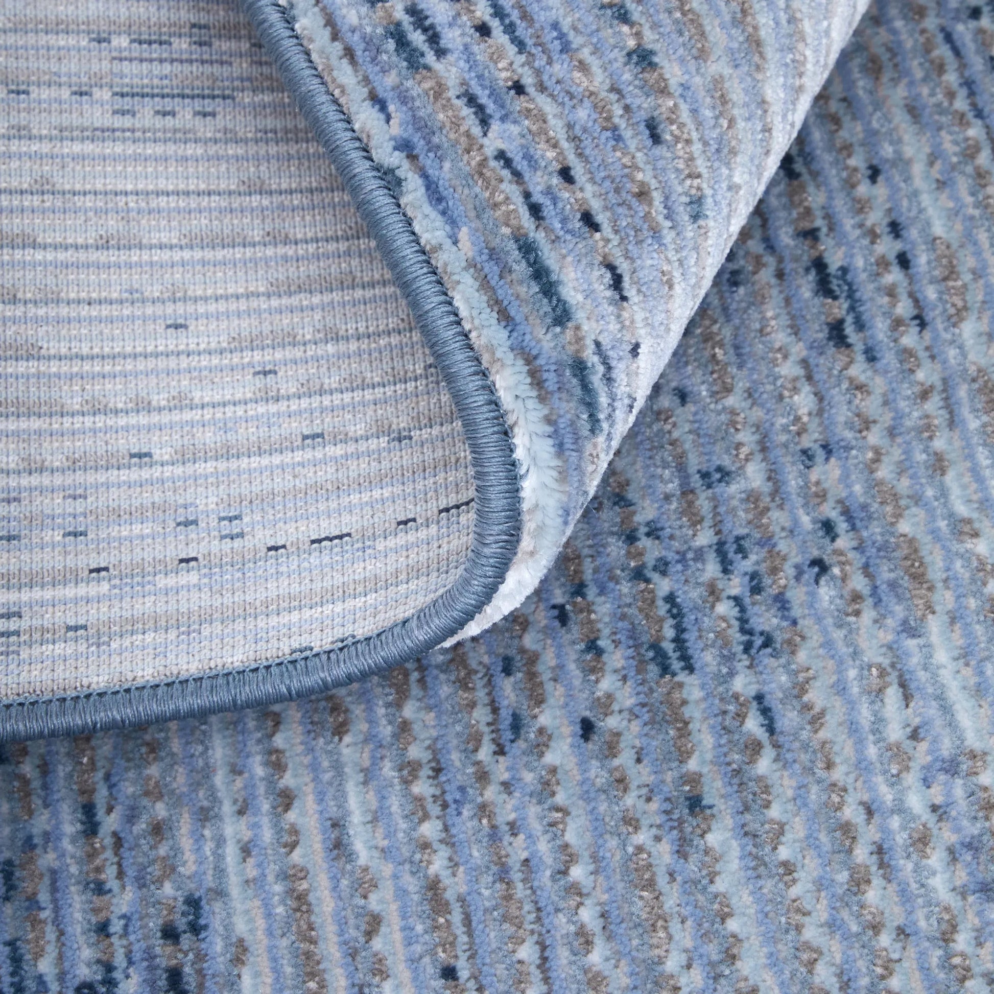 Deja Solid Rug - DJA39PJF by Feizy. Made from polypropylene, polyester in a unique style.