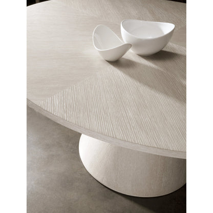 Mar Monte Round Dining Table by Artistica Home in champagne taupe. Made from unique in a modern style.