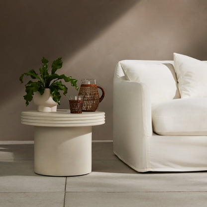 Grecia Outdoor End Table by Four Hands in white. Made from concrete in a modern style.