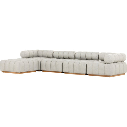 Roma Outdoor 4PC Sectional W/Ottoman by Four Hands in faye ash and natural teak. Made from 100% olefin, solid teak, 91% polyurethane foam pad, 9% polyester fiber batting in a modern style.