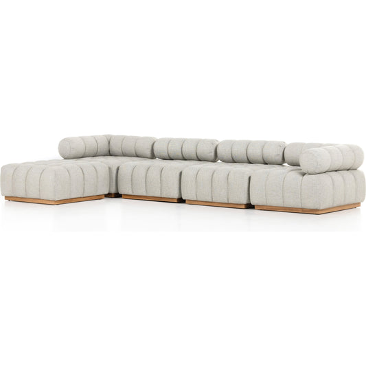 Roma Outdoor 4PC Sectional W/Ottoman by Four Hands in faye ash and natural teak. Made from 100% olefin, solid teak, 91% polyurethane foam pad, 9% polyester fiber batting in a modern style.