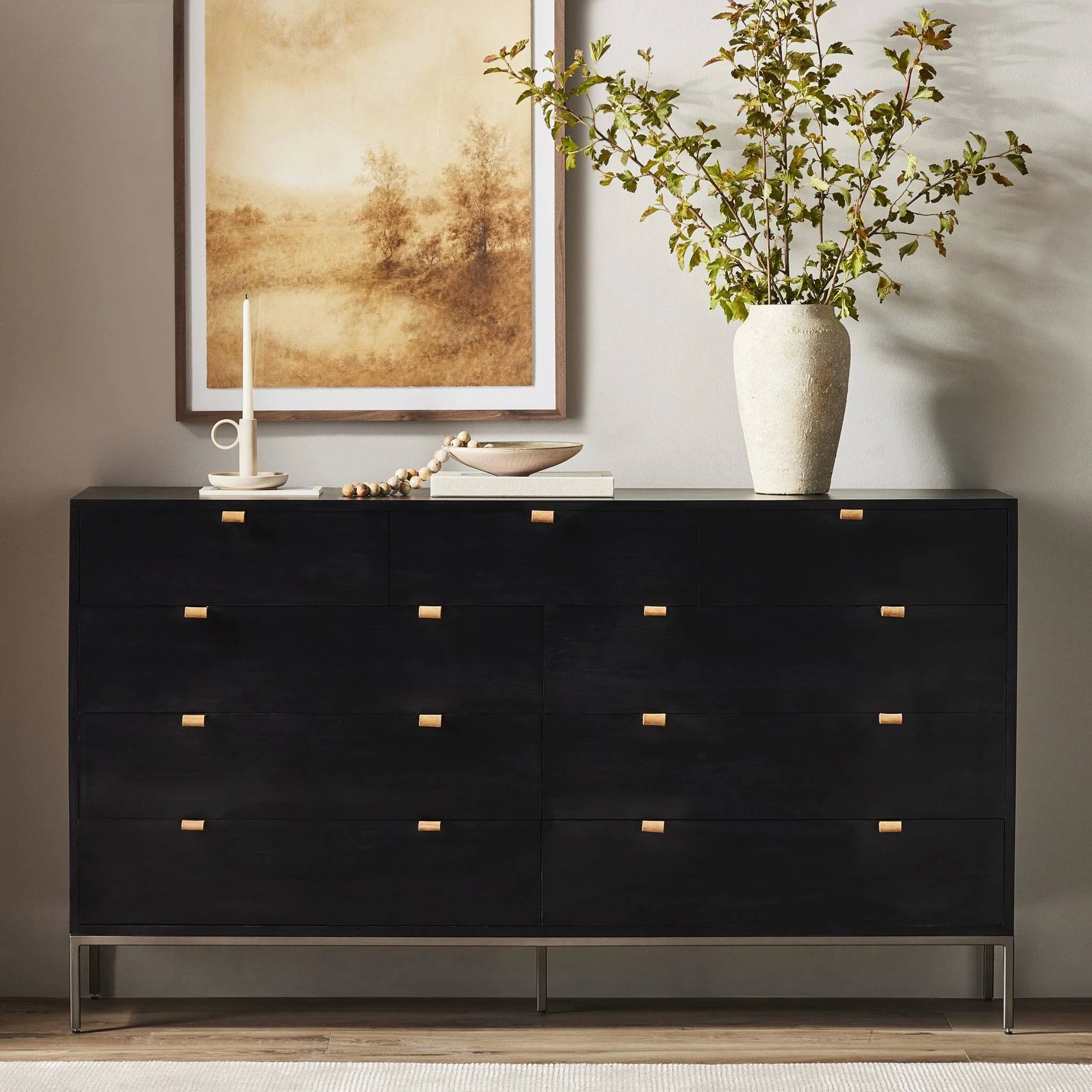 Trey 9 Drawer Dresser by Four Hands. Made from solid poplar, top grain leather in a transitional style.