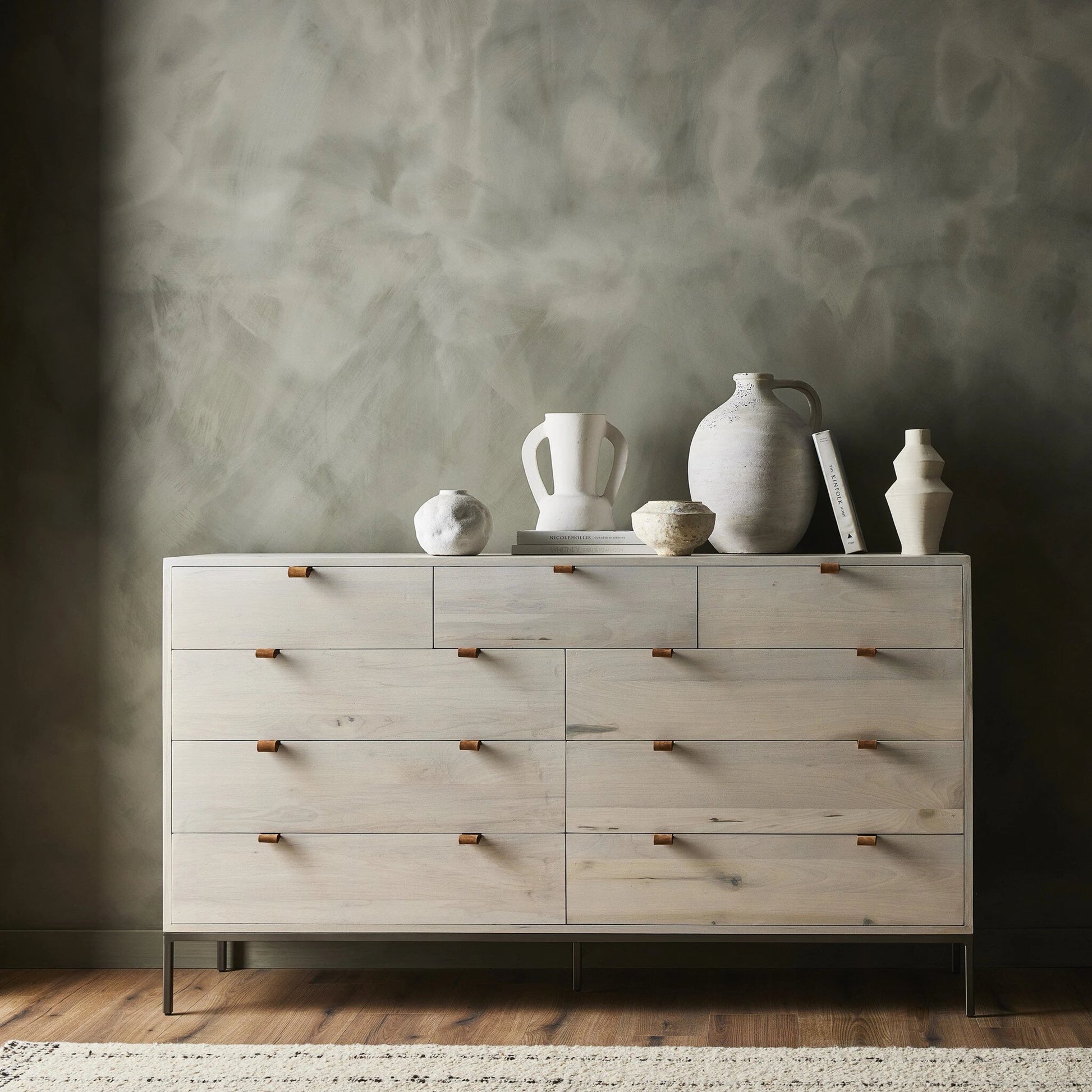 Trey 9 Drawer Dresser by Four Hands. Made from solid poplar, top grain leather in a transitional style.
