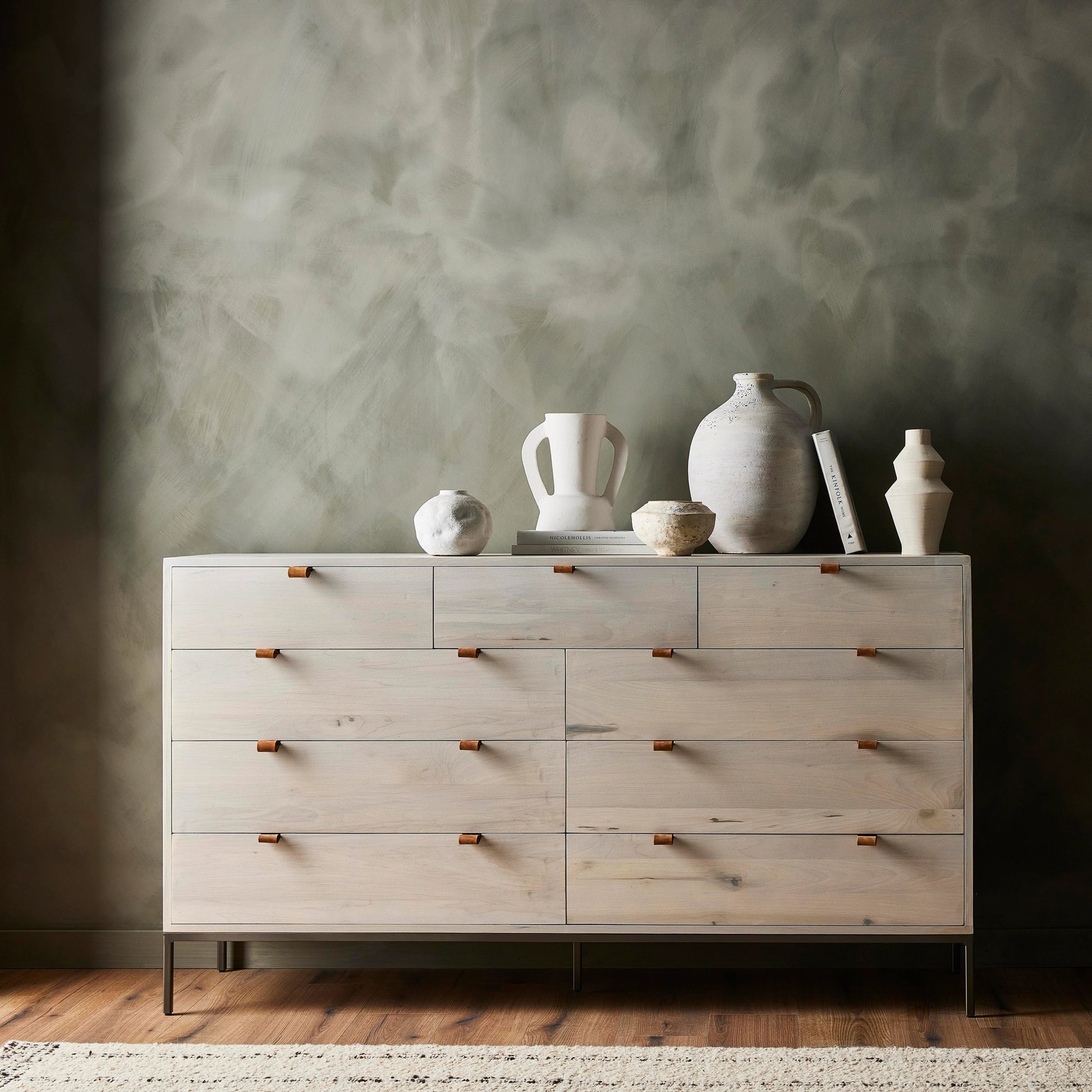 Trey 9 Drawer Dresser by Four Hands. Made from solid poplar, top grain leather in a transitional style.