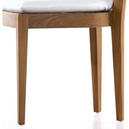 Britt Outdoor Dining Chair by Four Hands in natural teak, stinson white. Made from 100% olefin, solid teak, 100% polyethylene in a coastal style.
