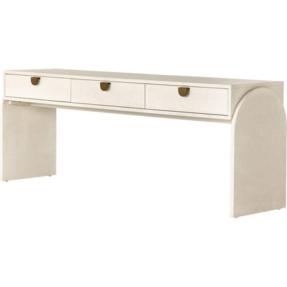 Cressida Console Table by Four Hands in light antique brass. Made from painted linen in a modern style.