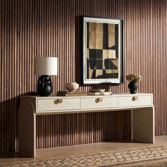 Cressida Console Table by Four Hands in ivory and light antique brass. Made from painted linen in a modern style.