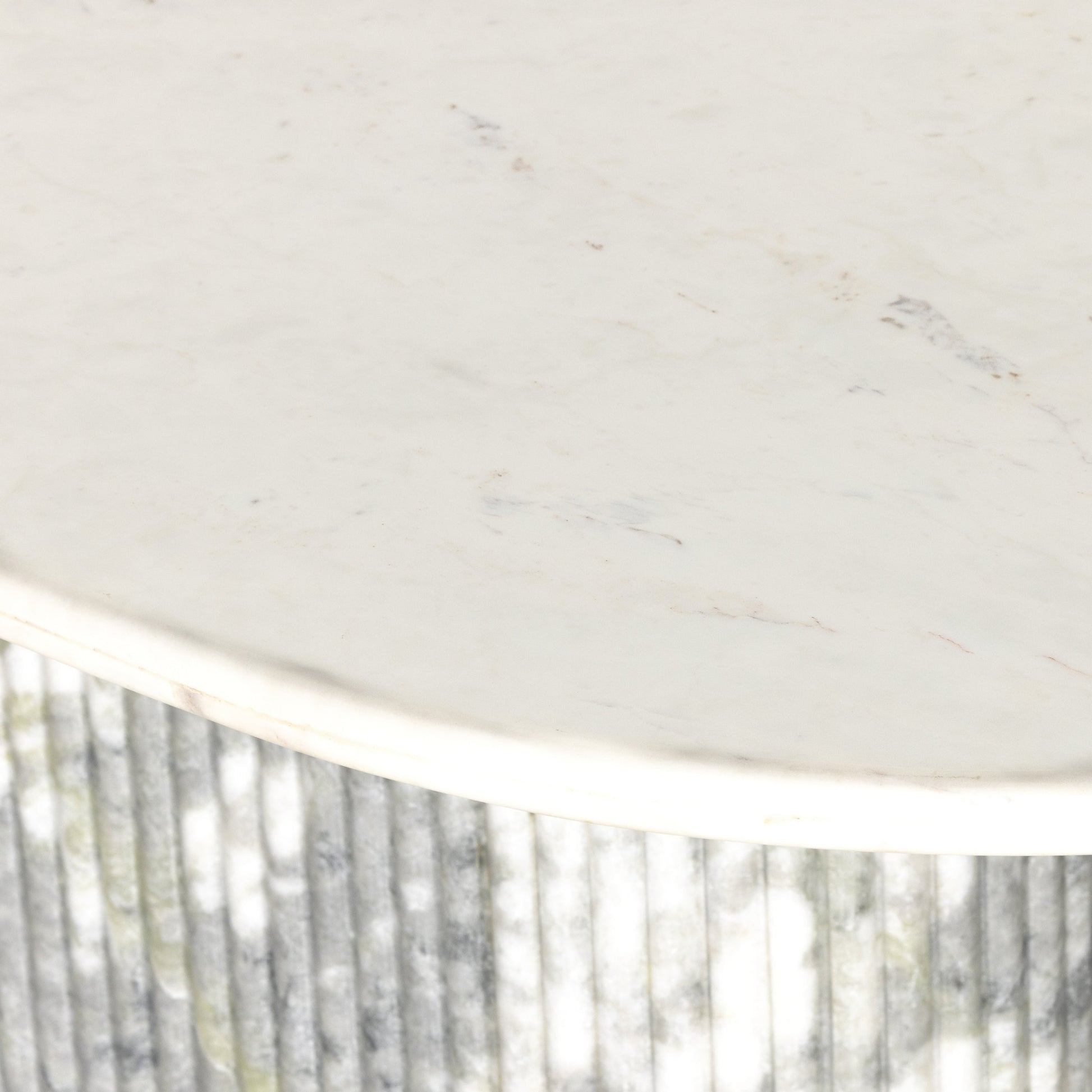 Oranda Dining Table by Four Hands in white scalloped marble, polished white marble w, sealant and white scalloped marble, polished white marble. Made from solid marble in a modern style.