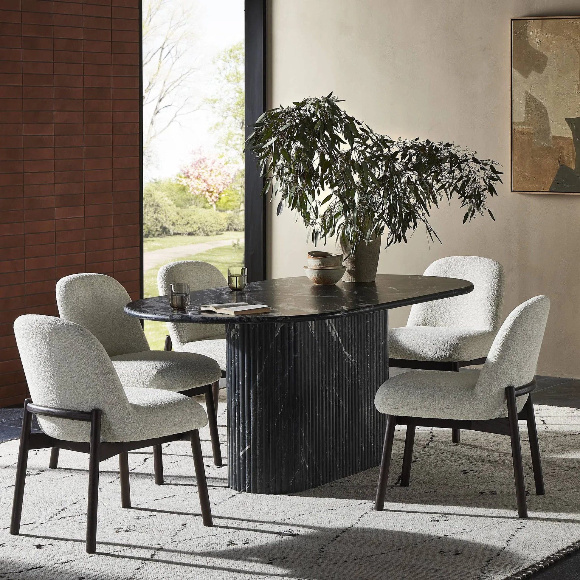 Oranda Dining Table by Four Hands in polished white marble w/ sealant, white scalloped marble. Made from solid marble in a modern style.
