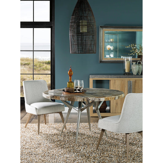 Caldera Round Dining Table by Artistica Home in silver. Made from unique in a modern style.