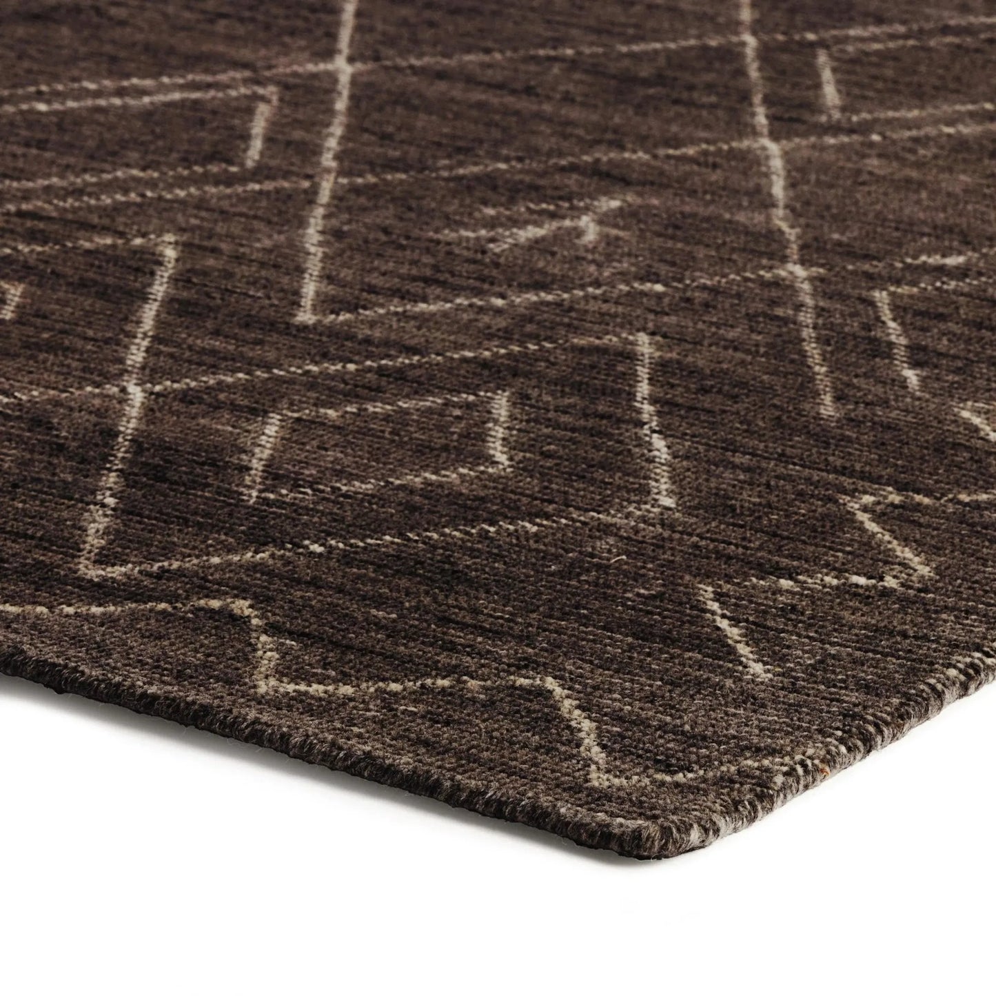 003 SI-2320180 | Closeup | Nador Moroccan Hand Knotted Rug by Four Hands in nador espresso. Made from 90% wool, 10% cotton in a unique style.
