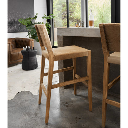 Villa Bar Stool by Four Hands in light hair on hide, natural beech. Made from hair on hide, solid beech, iron in a modern style.