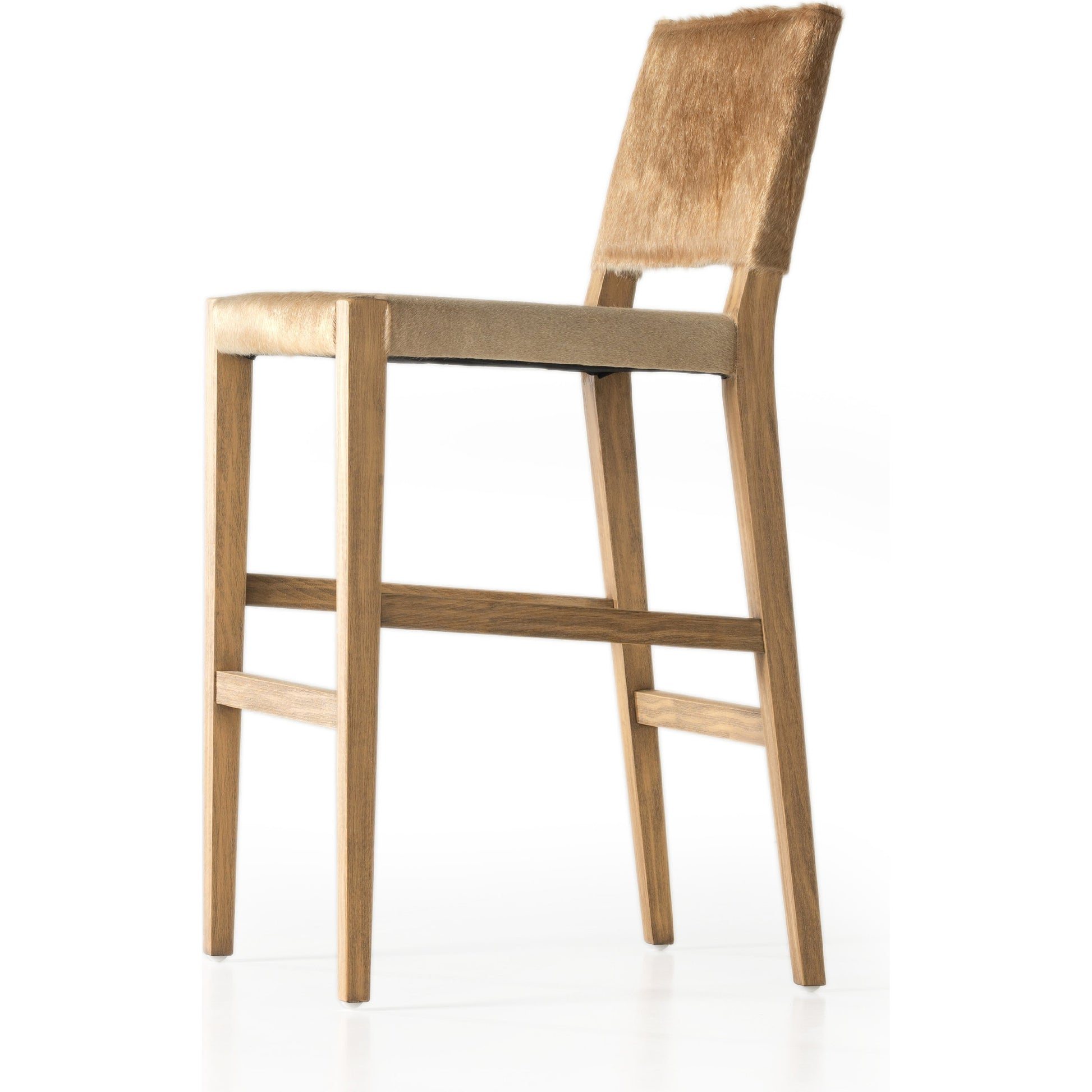 Villa Bar Stool by Four Hands in light hair on hide, natural beech. Made from hair on hide, solid beech, iron in a modern style.