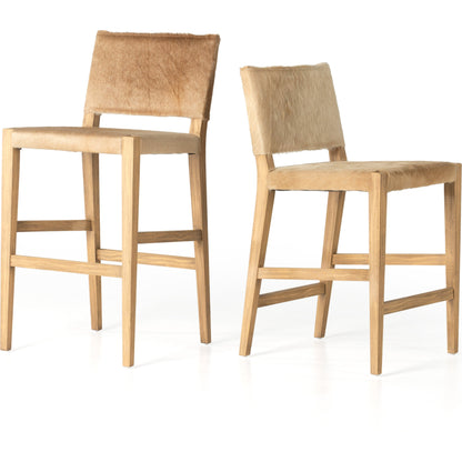 Villa Bar Stool by Four Hands in light hair on hide, natural beech. Made from hair on hide, solid beech, iron in a modern style.
