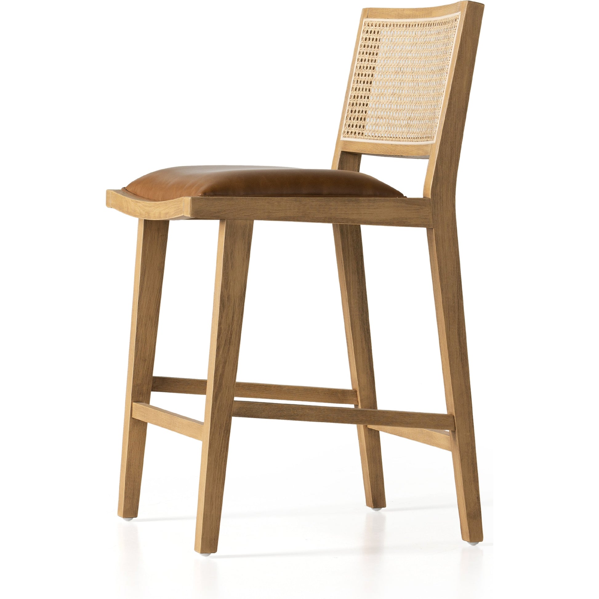 Sage Counter Stool by Four Hands in natural cane, sierra butterscotch. Made from faux leather, solid beech, cane in a coastal style.