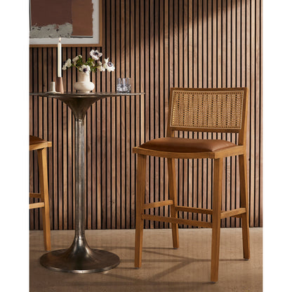 Sage Counter Stool by Four Hands in natural cane, sierra butterscotch. Made from faux leather, solid beech, cane in a coastal style.