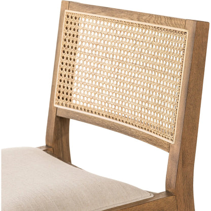 Sage Bar Stool by Four Hands in savile flax, toasted oak, natural cane. Made from 92% polyester, 8% flax/linen, solid oak, cane in a rustic style.