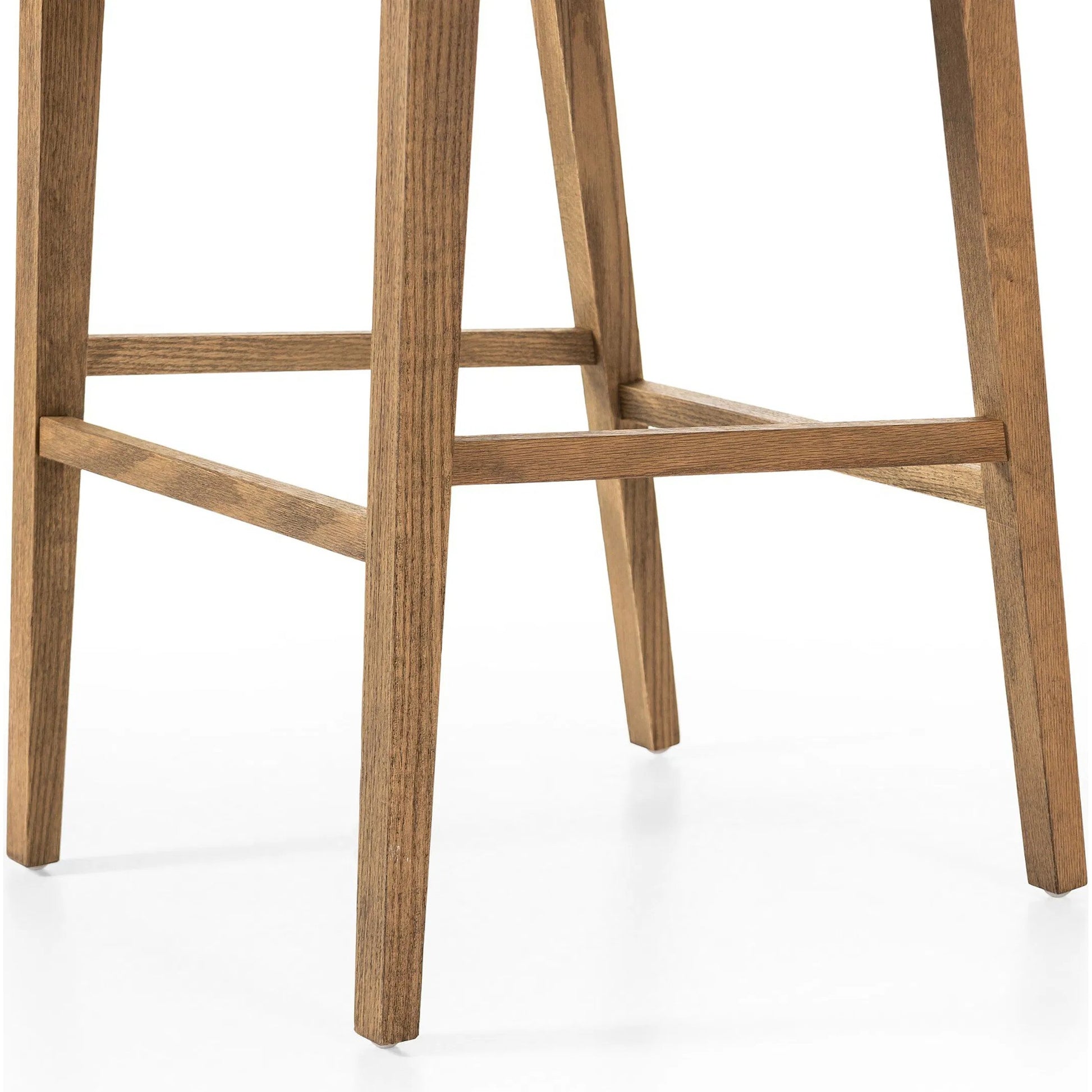 Sage Bar Stool by Four Hands in savile flax, toasted oak, natural cane. Made from 92% polyester, 8% flax/linen, solid oak, cane in a rustic style.