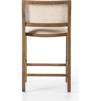 Sage Counter Stool by Four Hands in sierra butterscotch, natural beech, natural cane. Made from faux leather, solid beech, cane in a coastal style.