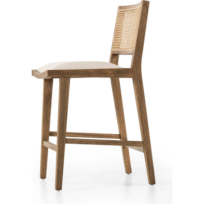 Sage Counter Stool by Four Hands in sierra butterscotch, natural beech, natural cane. Made from faux leather, solid beech, cane in a coastal style.